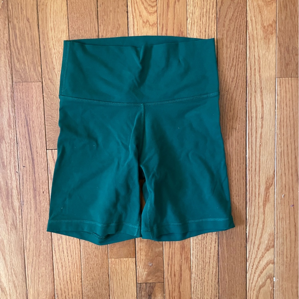 Green Aritzia biker shorts